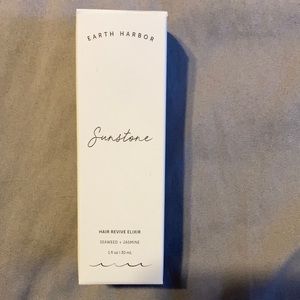 Earth Harbor sunstone hair revive elixir.